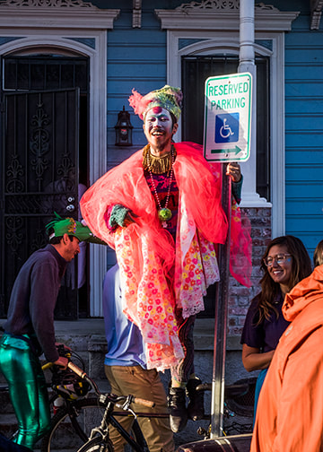 A brightly colored Neon Mardi Gras Costume on the Streets of New Orleans.